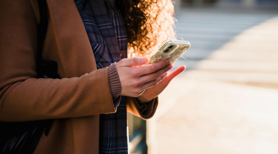 Woman receiving Promotional SMS